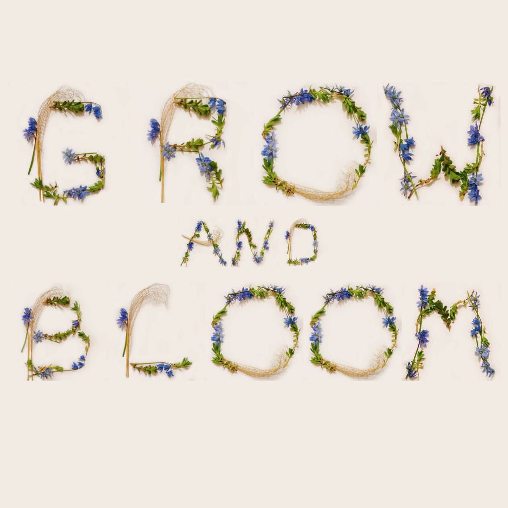 "Grow and Bloom" spelled out in grass, leaves, and flowers